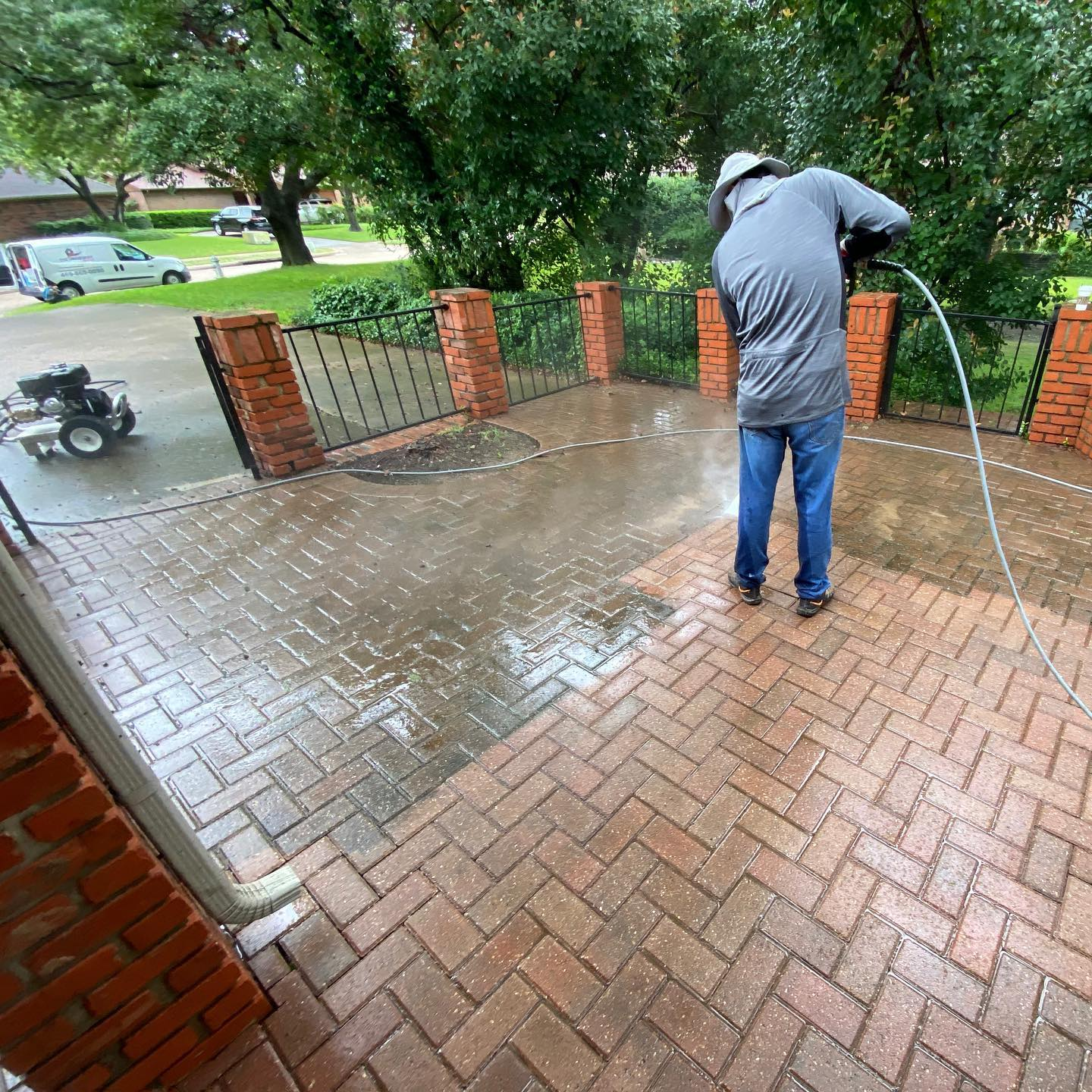 Professional pressure washer at work